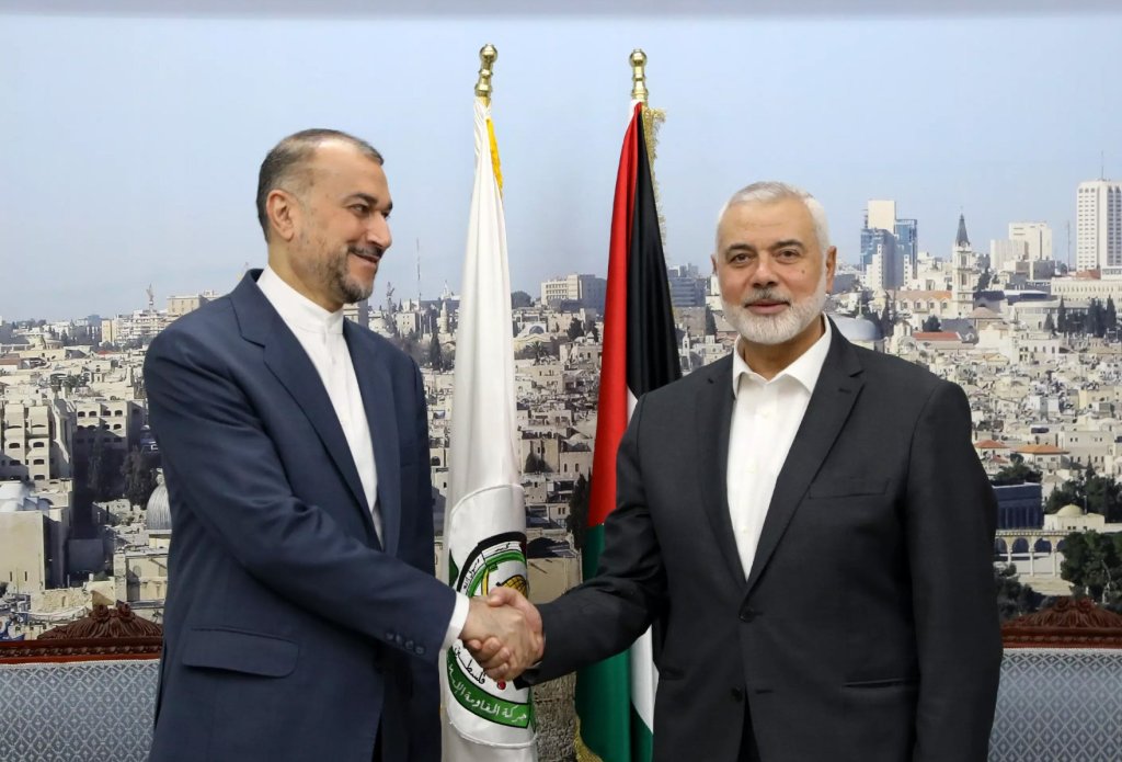 A handout picture made available by the Iranian foreign ministry shows Iranian Foreign Minister Hossein Amir-Abdoulahian (L) meeting Hamas leader Ismail Haniyeh in Doha, Qatar, 13 February 2024.