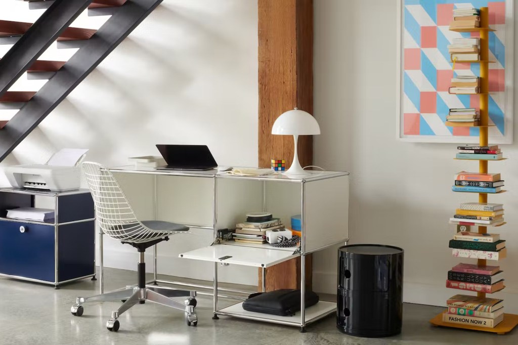 White modern desk with matching chair and decor