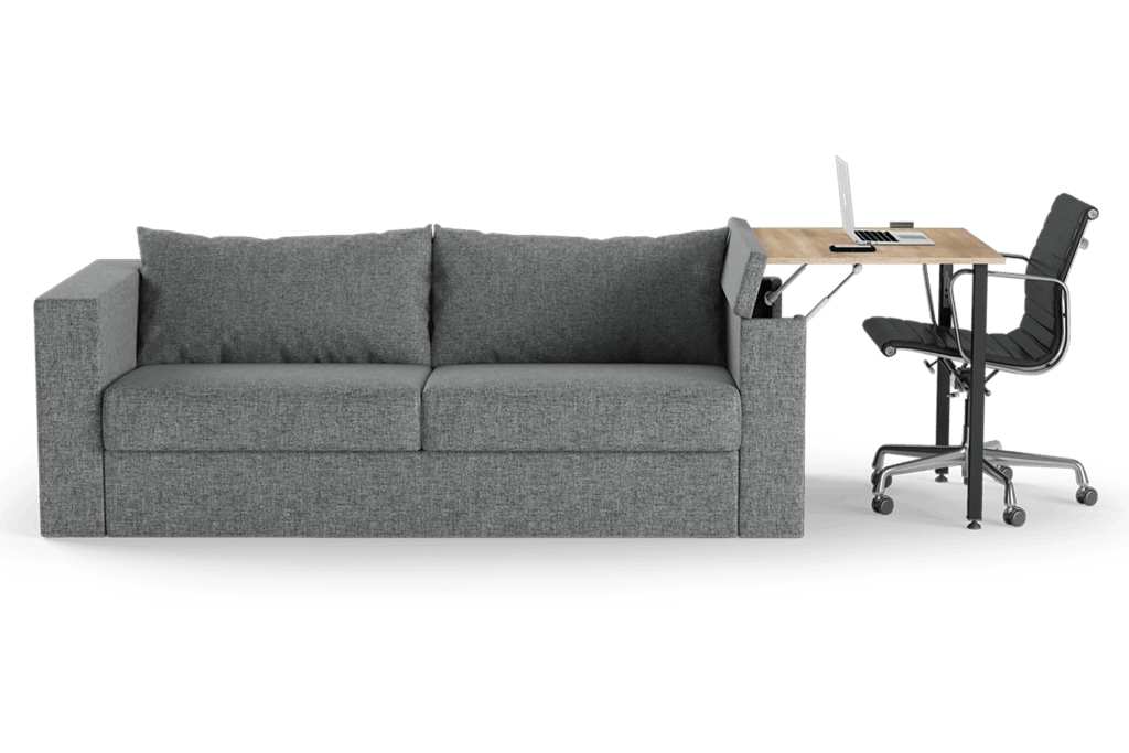 A gray couch with a wooden desk coming out of the left arm