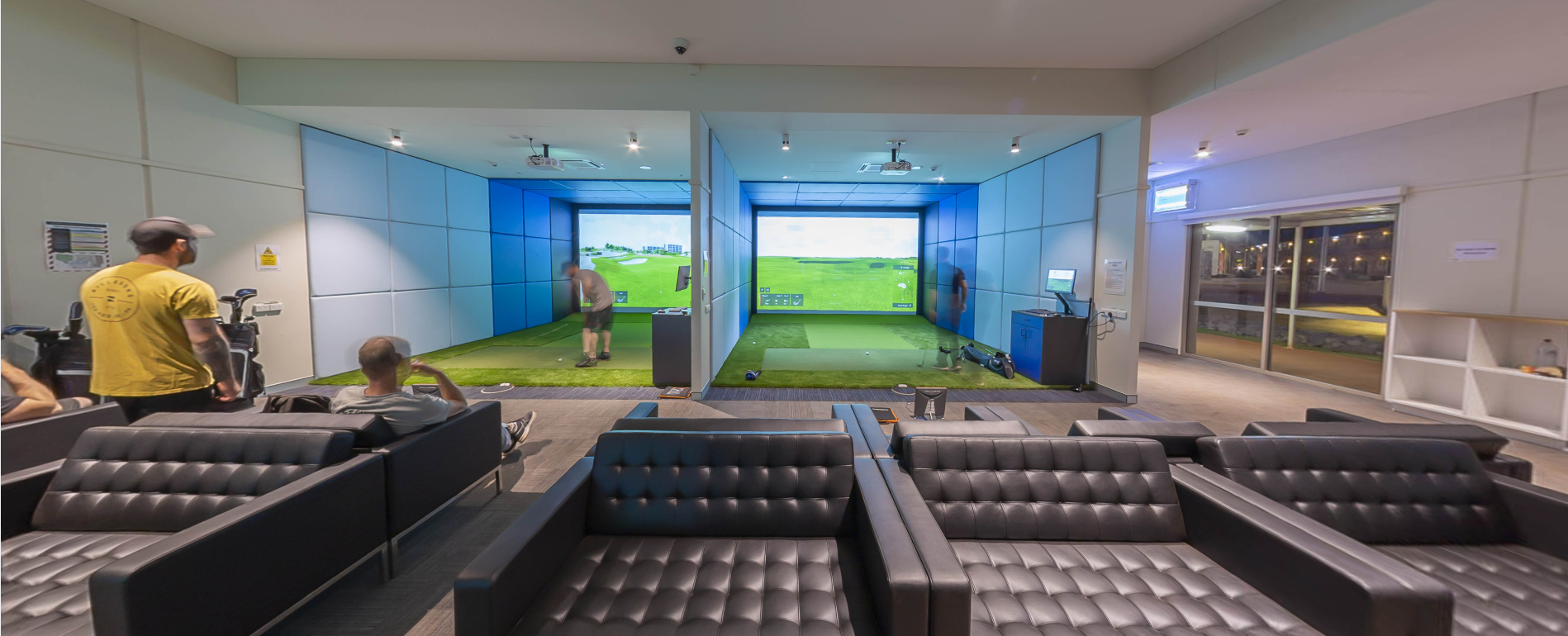 Workers enjoying virtual golf in one of the recreational centres